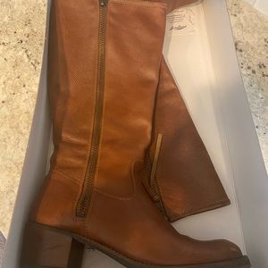 Tall brown leather boots